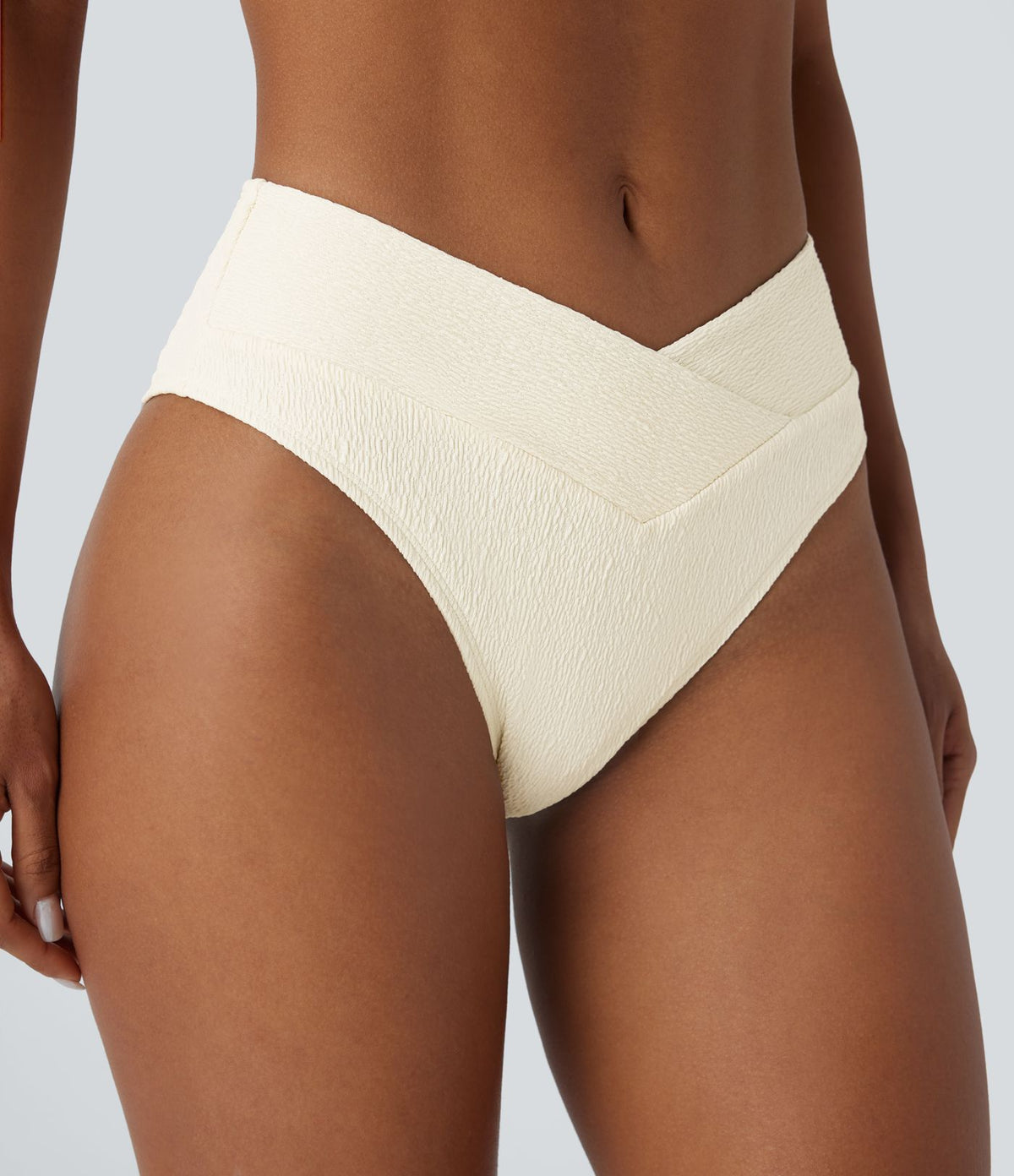 Bas de maillot de bain bikini texturé croisé