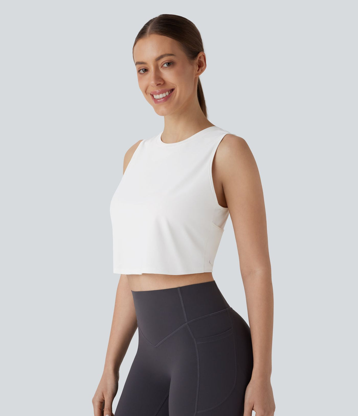 Débardeur Court de Yoga Uni à Ourlet Croisé avec Découpes