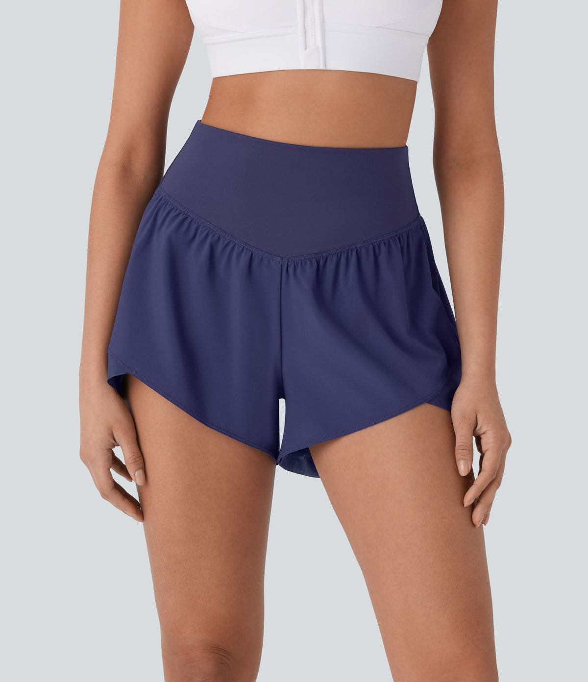 Breezeful™ Short yoga taille haute avec poche arrière ourlet croisé séchage rapide