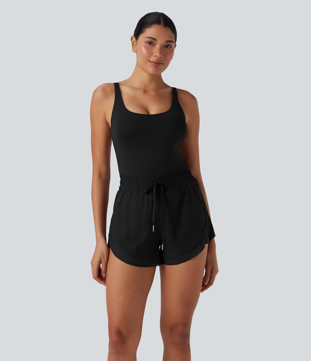 Combi-short de running 2-en-1 dos nu smocké avec cordon de serrage et poches latérales