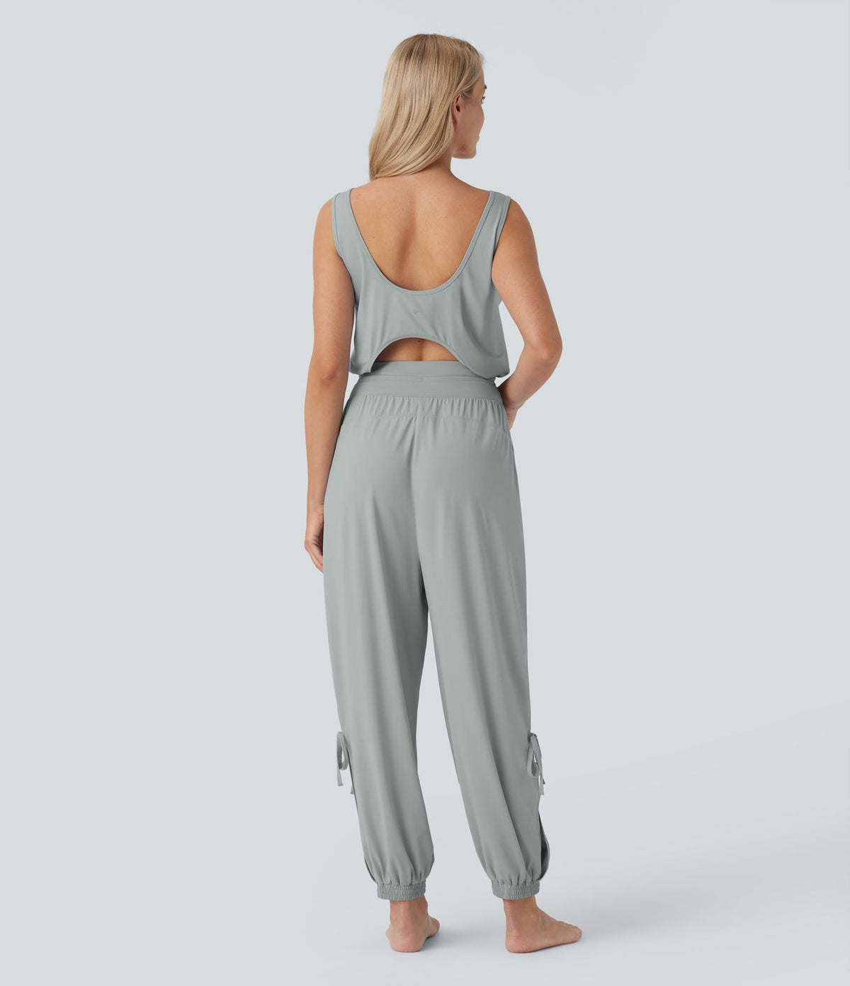 Combinaison de yoga col bateau sans manches dos nu avec découpes et poches latérales à cordon de serrage effet frais InstantCool, protection solaire UPF50+