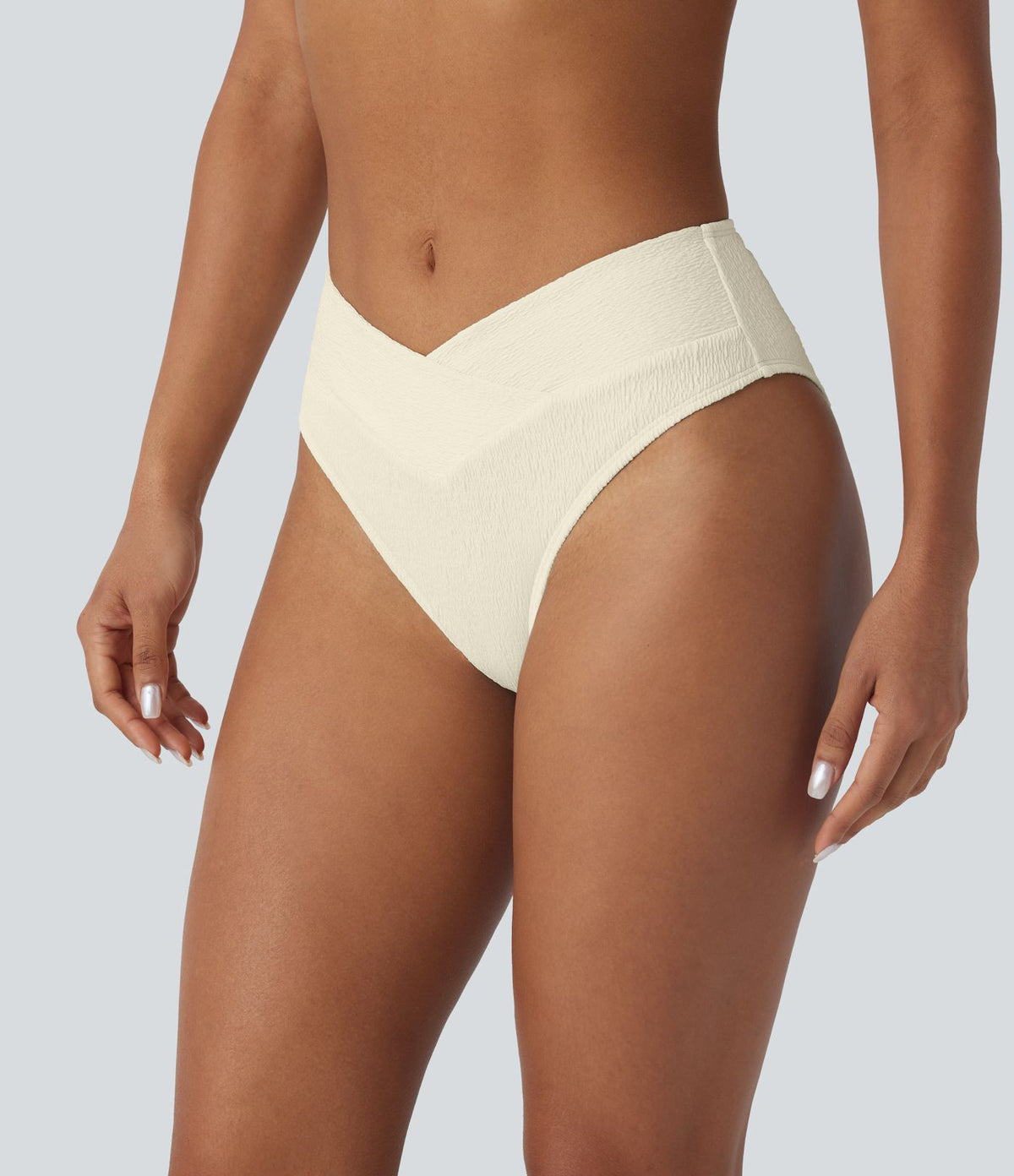 Bas de maillot de bain bikini texturé croisé