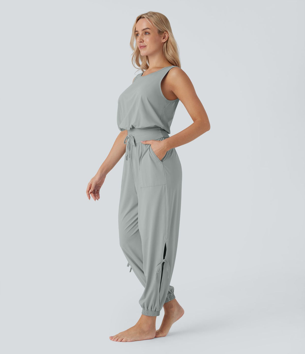 Combinaison de yoga col bateau sans manches dos nu avec découpes et poches latérales à cordon de serrage effet frais InstantCool, protection solaire UPF50+