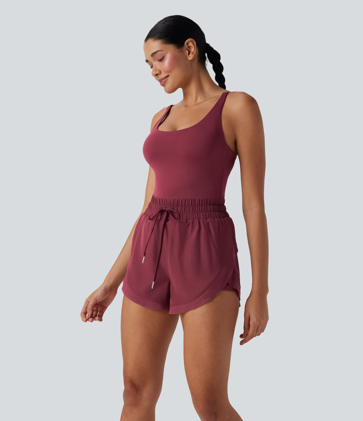 Combi-short de running 2-en-1 dos nu smocké avec cordon de serrage et poches latérales