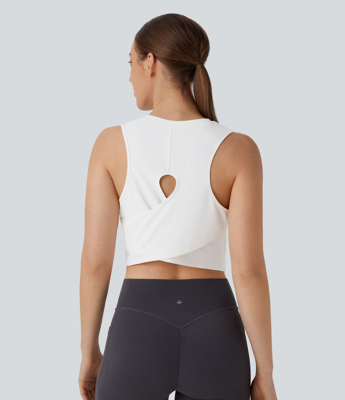Débardeur Court de Yoga Uni à Ourlet Croisé avec Découpes